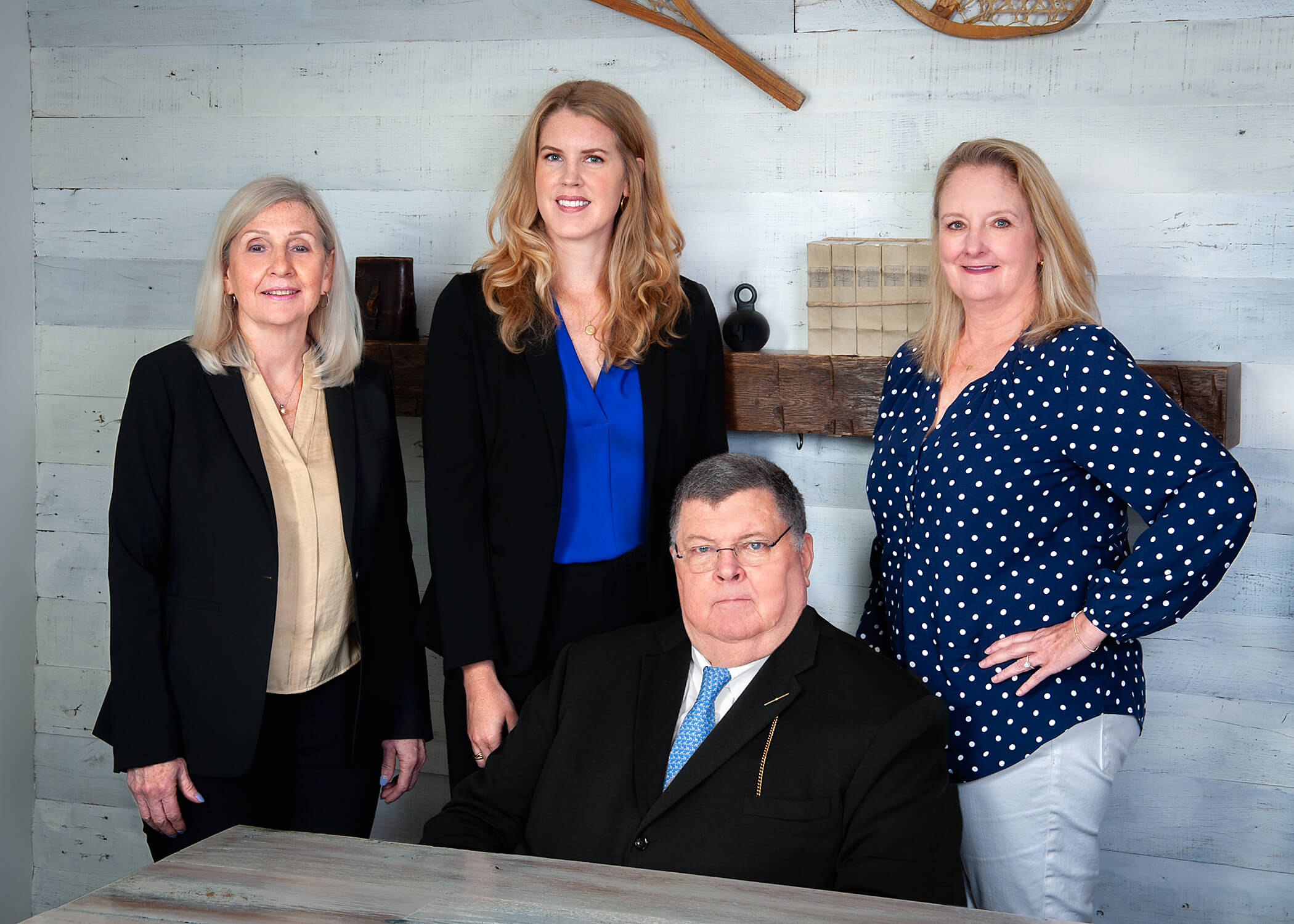 A photo of the 680 group team: Cosmo sits in the front with the staff behind him. From left to right: Shelia Whitten, Emily Boyd, Jana  Burke
